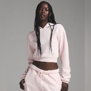 Skims Cotton Fleece Shrunken Hoodie in “Barely There Pink”